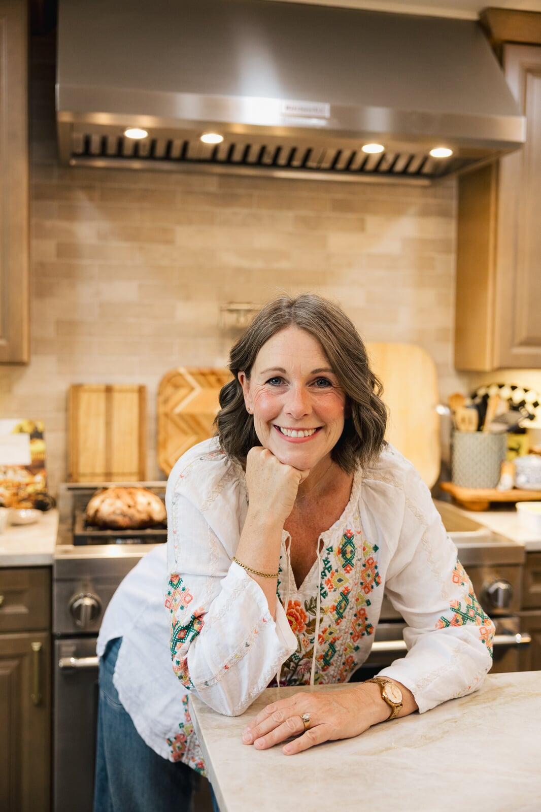 A woman joyfully eating fresh food.