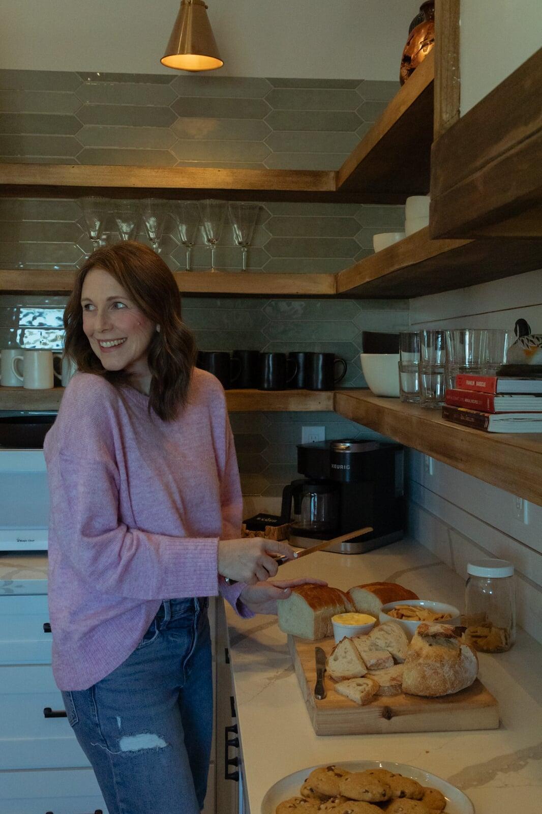 A woman joyfully eating fresh food.