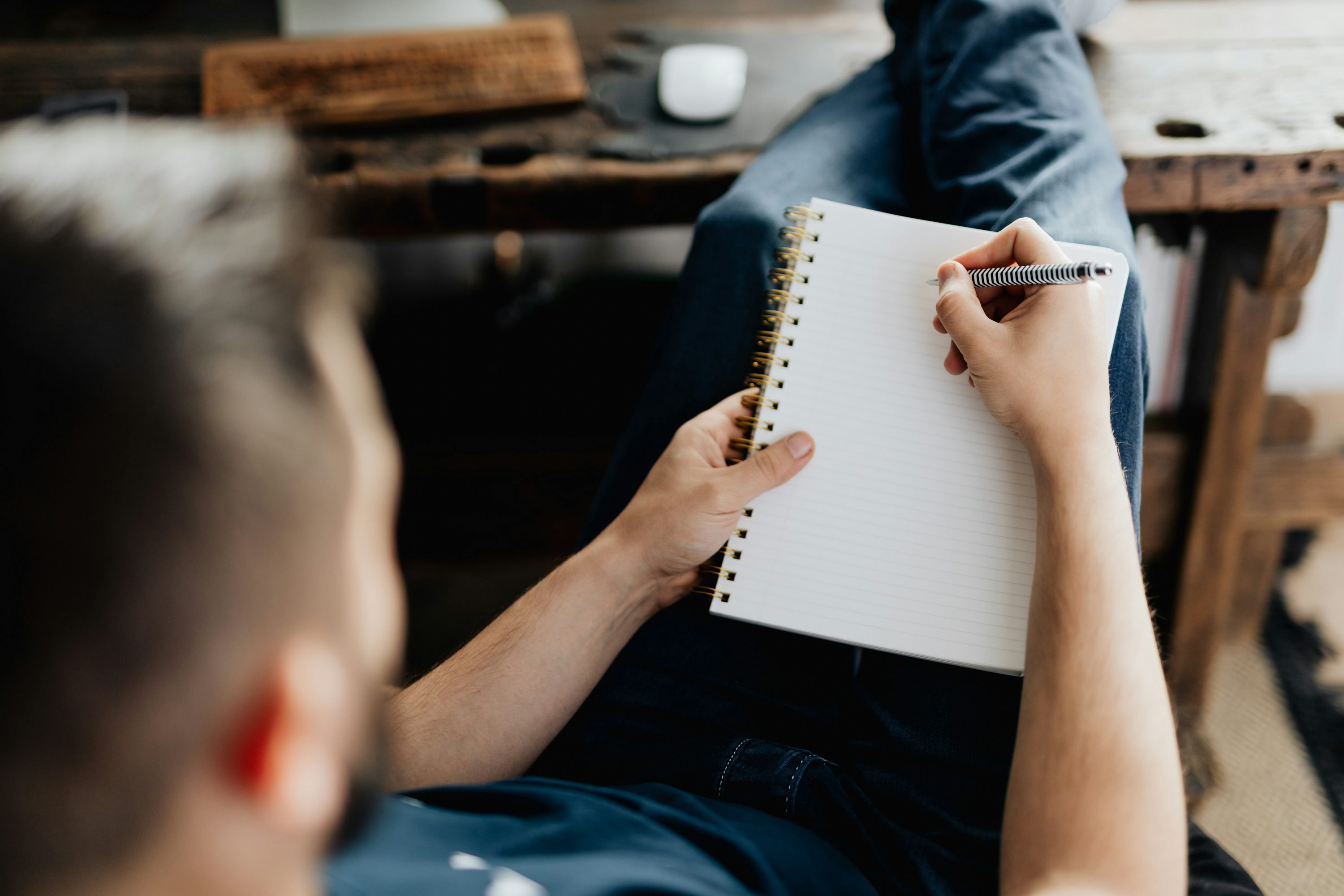 Illustration of a woman at a desk journaling about her diet.
